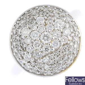 An 18ct white gold diamond circular cluster ring. 