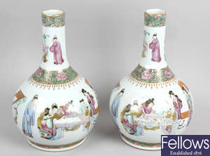A pair of 19th century Canton famille rose vases.