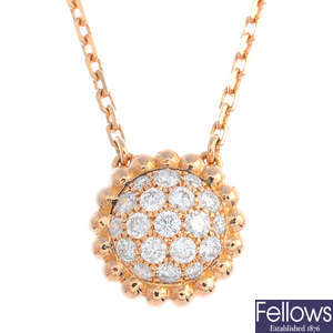 VAN CLEEF & ARPELS - a diamond 'Perlee' pendant, on chain.