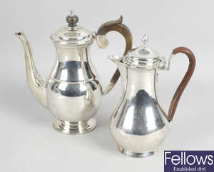 A late Victorian silver hot water pot & a modern silver coffee pot. (2). 