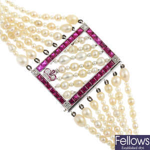 A cultured pearl, seed pearl, diamond and synthetic ruby seven-strand choker.
