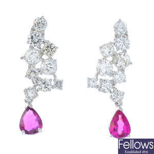 A pair of diamond and ruby earrings.