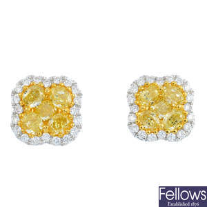 A pair of 'yellow' diamond and diamond earrings.