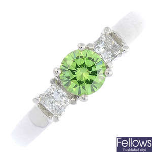 An 18ct gold 'green' diamond and diamond ring.