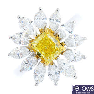 A 'yellow' diamond and diamond floral cluster ring.