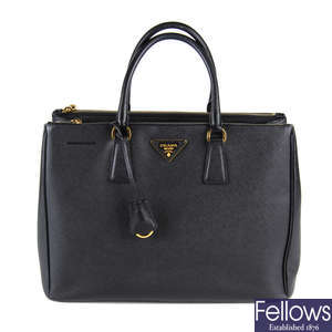 PRADA - a black Saffiano leather handbag.