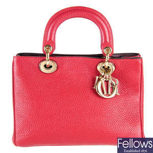 CHRISTIAN DIOR - a red Mini Diorissimo handbag.