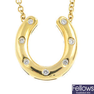 An 18ct gold diamond pendant, on 18ct gold chain.