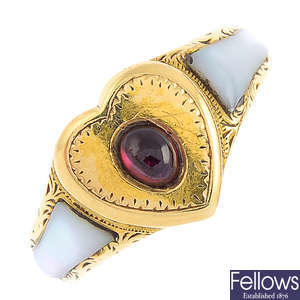 An Edwardian 18ct gold garnet and mother-of-pearl ring.