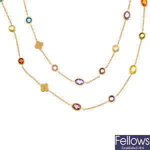 An 18ct gold two-row gem-set necklace.
