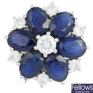 A platinum diamond and sapphire cluster ring.