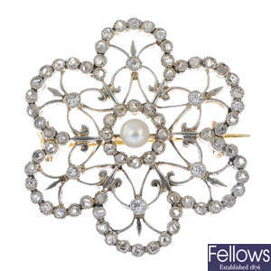 An Edwardian platinum and 12ct gold, seed pearl and diamond brooch.