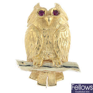 A 9ct gold ruby owl brooch.