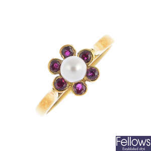 An 18ct gold ruby and seed pearl cluster ring.