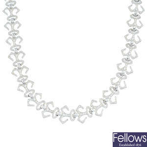GARRARD - an 18ct gold diamond crown necklace.