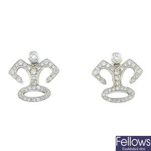 GARRARD - a pair of 18ct gold diamond crown earrings.
