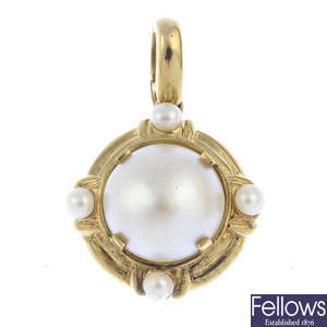 A mabe pearl and cultured pearl pendant.