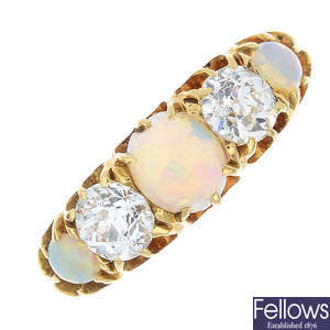 A late Victorian 18ct gold opal and diamond five-stone ring.