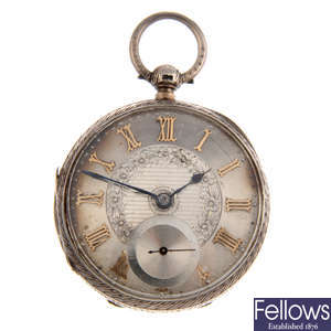 A silver open face pocket watch.