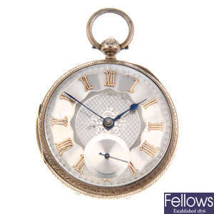 A silver open face pocket watch.