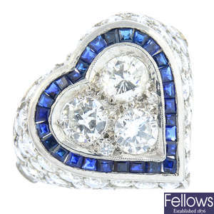 A sapphire and diamond heart ring.