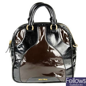 MIU MIU - a patent leather handbag.