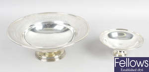 An early 20th century pierced silver footed dish & a later, smaller example. (2).