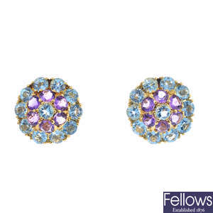 A pair of 18ct gold amethyst and topaz earrings.