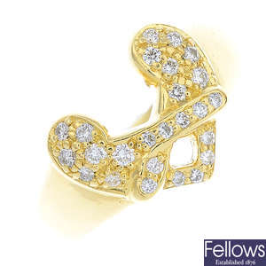 BOODLES - an 18ct gold diamond heart ring.