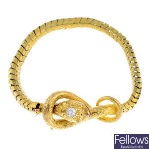 A mid Victorian gold diamond snake bracelet.