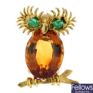 A 1970's citrine and emerald owl brooch.