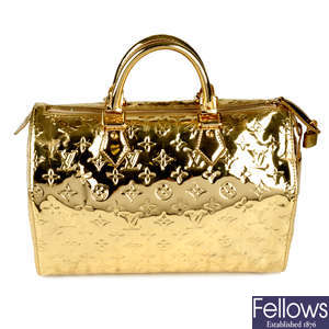 Sold at Auction: Louis Vuitton, Louis Vuitton Bucket Bag with Pouch