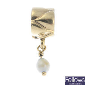 PANDORA - a 14ct gold cultured pearl charm.