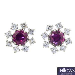 A pair of Thai ruby and diamond cluster earrings.
