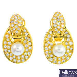 A pair of 18ct gold cultured pearl and diamond earrings.