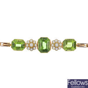 An early 20th century gold, peridot and split pearl bracelet.