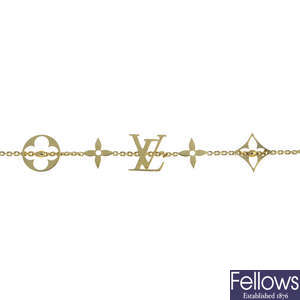 LOUIS VUITTON - an 18ct gold 'Monogram' bracelet.