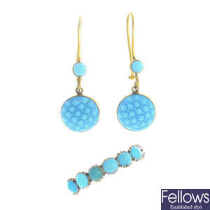 A turquoise ring and a pair of blue glass earrings.