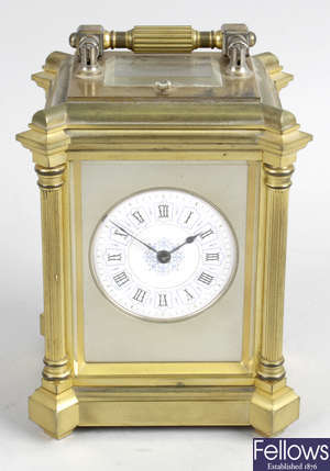 A late 19th century brass cased repeating carriage clock.