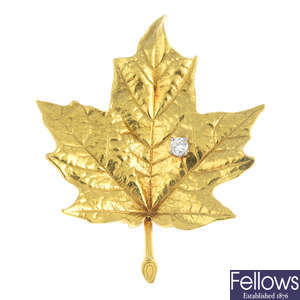 TIFFANY & CO. - a 1970s 18ct gold diamond leaf brooch.