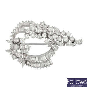 A platinum diamond brooch.