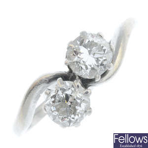 A diamond two-stone ring.