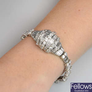 A vari-cut diamond bracelet, converted from a cocktail watch.
