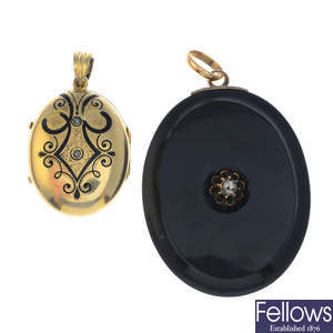 A late Victorian onyx and diamond locket, and a late 19th century black enamel locket.