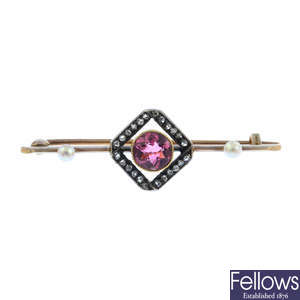 An Edwardian gold and silver, pink tourmaline, diamond and seed pearl bar brooch.