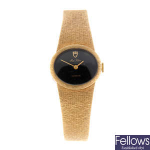 TUDOR - a lady's 9ct yellow gold Miss Tudor bracelet watch.