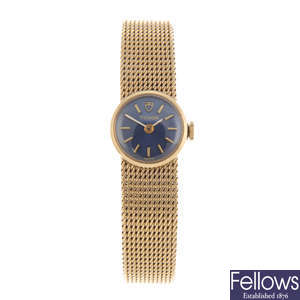 TUDOR - a lady's 9ct yellow gold bracelet watch.