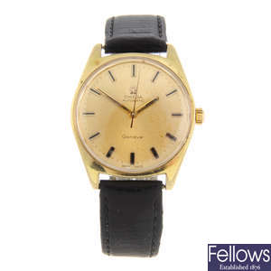 OMEGA - a gentleman's gold plated GenÃ¨ve wrist watch.