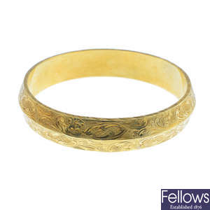A late 19th century 14ct gold bangle.