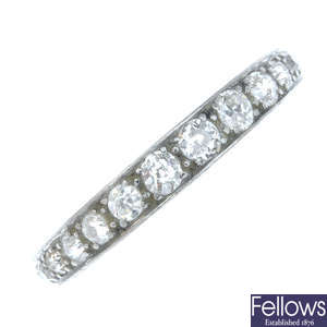 An early 20th century platinum diamond full eternity ring.